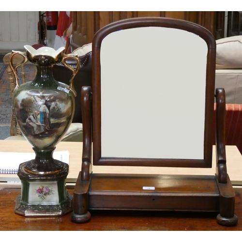 76 - A Victorian mahogany swivel toilet mirror, together with a twin handled vase on stand (2).