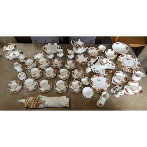 79 - A Royal Albert 'Old Country Roses' dinner service, comprising over 70 pieces.