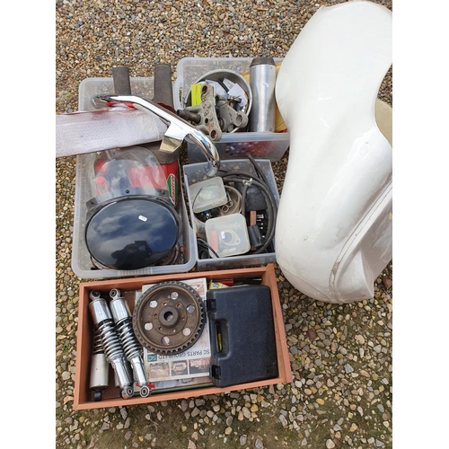 78 - A quantity of motor cycle spares, to include a fairing, front mudguard and a seat. (5).