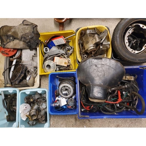 86 - Various Lambretta spares, to include carburettor parts, a seat and various mechanical items.