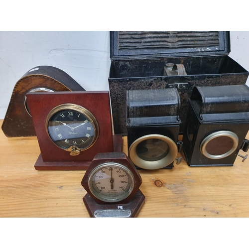 43 - A Walford motorcar clock, a Smiths clock, a Rototherm gauge, together with a bicycle front and rear ... 