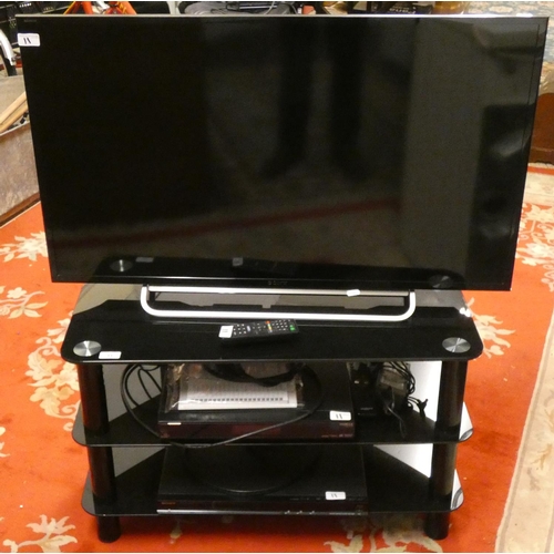 11 - A Sony Bravia 40 inch LCD television, a Sony Blu-Ray player, a Humax Free Sat player and stand (4).