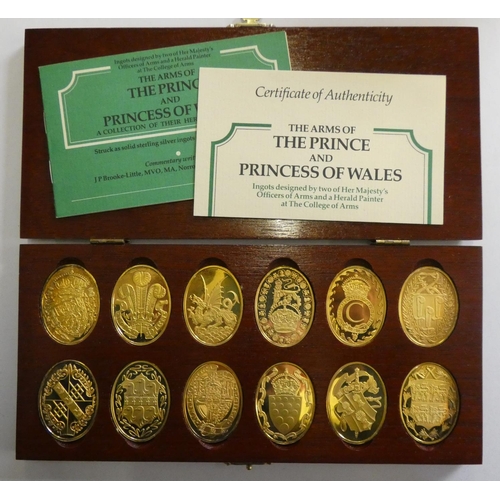 125 - The Arms of The Prince and Princess of Wales, gold plated silver, case.