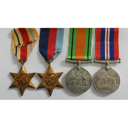 128 - WWII to D.G. Thomas, 1939-1945 Star, Africa Star, Defence Medal and War Medal, box and awards paper.