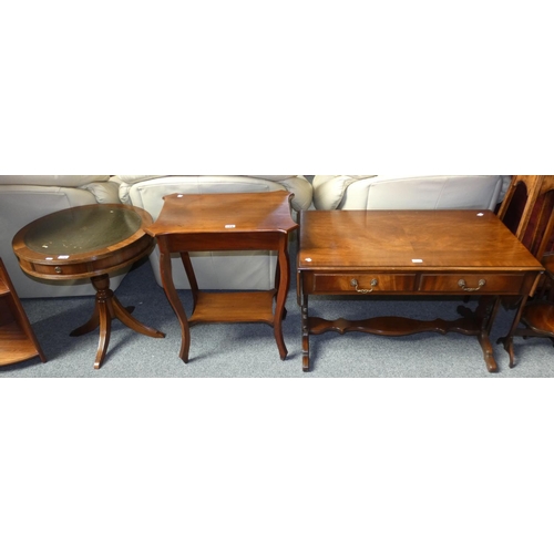 174 - A mahogany drop leaf occasional table, 58 cm deep x 146 cm wide (extended), mahogany drum table and ... 
