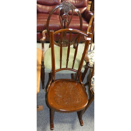180 - A mahogany Elbon chair together with a low rocking chair (2).
