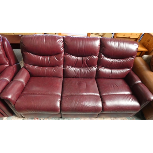 183 - A lazyboy 3 seater settee approx 195 cm wide in wine red leather, together with a matching 2 seater ... 