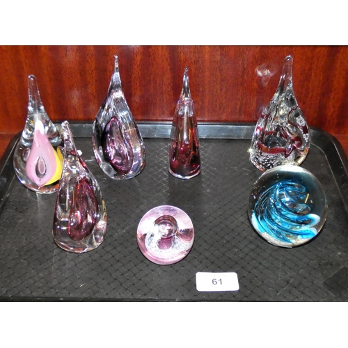 61 - A collection of seven paperweights.