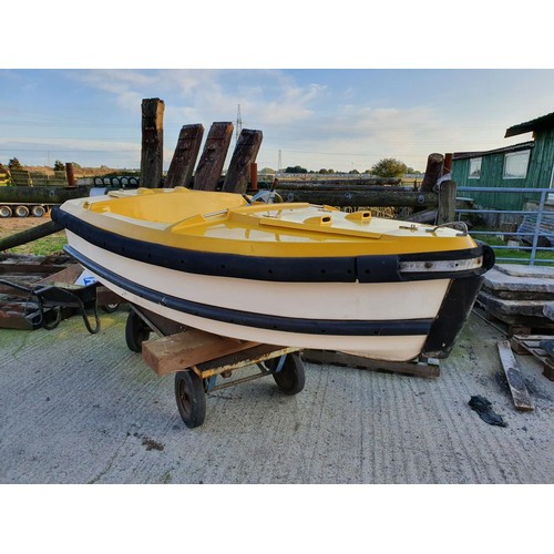 61 - A boating lake motor boat, c.1950/60, of yellow fibreglass mounted with a Stuart Turner R3MC marine ... 