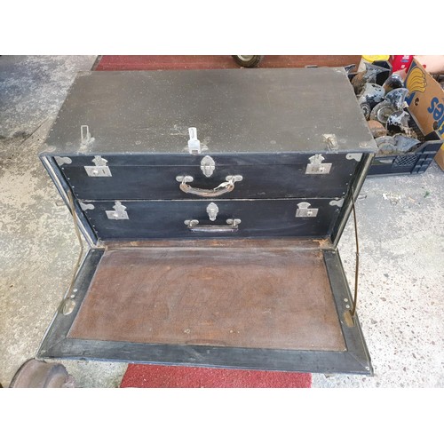 68 - A Brexton luggage box, opening to reveal two suitcases.