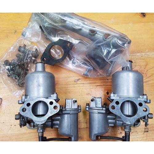 125 - A pair of SU 1217/E carbs, a Webber 34DMTL carb, a pair of SU AUC2009 carbs and other carbs.