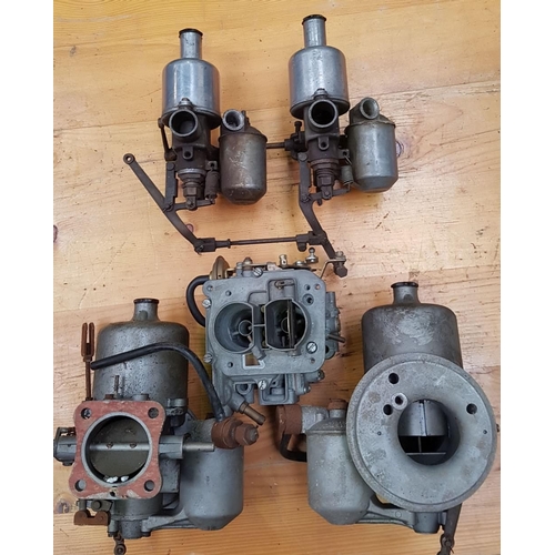 125 - A pair of SU 1217/E carbs, a Webber 34DMTL carb, a pair of SU AUC2009 carbs and other carbs.