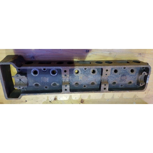 144 - An AC cylinder head, number RMC 18542, pre- war.