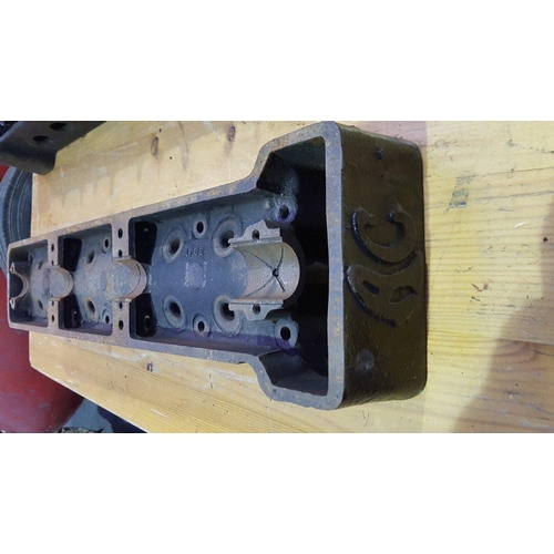 144 - An AC cylinder head, number RMC 18542, pre- war.