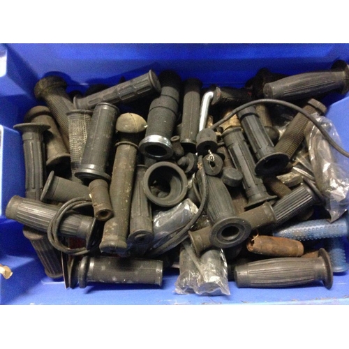 172 - A quantity of NOS and second hand motorcycle pedal and hand grips, including Norton and Triumph.