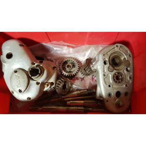 319 - Various Norton gearbox parts, including cases, numbered G5 825 and G102 8928, buyers should check ho... 