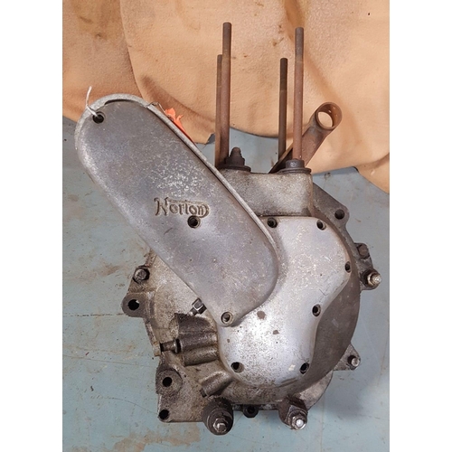 355 - c. 1936 Norton crankcases and flywheel, number 66247 and 82/113, buyers should check how complete th... 