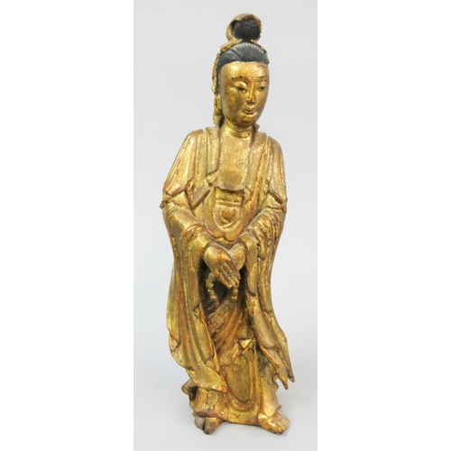 147 - A Japanese gilt carved wood statue of a man, height 20 cm.