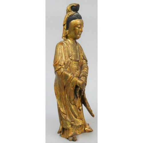 147 - A Japanese gilt carved wood statue of a man, height 20 cm.