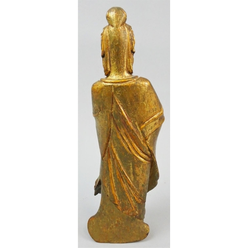 147 - A Japanese gilt carved wood statue of a man, height 20 cm.