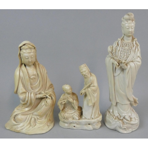 154 - A Chinese blanc de chine of Guanyin playing an instrument, height 29 cm, instrument A/F , another of... 