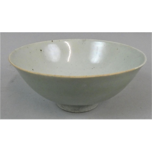 155 - A Chinese celdon glazed bowl, with two character mark, diameter 16.5 cm.