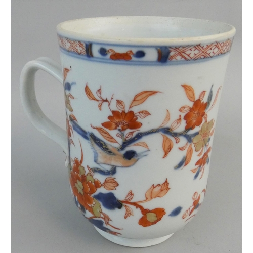 158 - A Chinese large baluster mug, with polychrome bird in a tree decoration, height 16 cm.