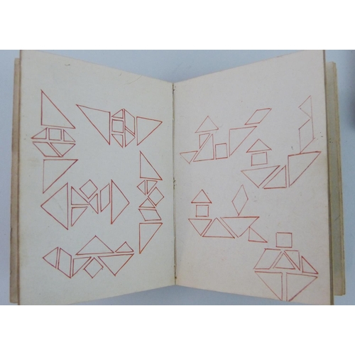 161 - A Cantonese ivory tangram puzzle accompanied with two xylographic books, the carved puzzle box conta... 