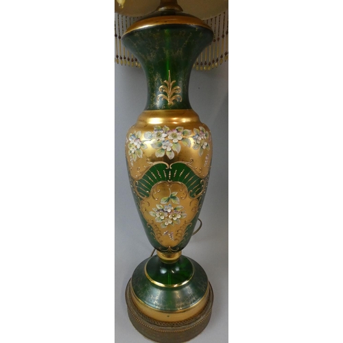 170 - A pair of large Victorian glass table lamps, of baluster form, the emerald green ground with gilt sc... 