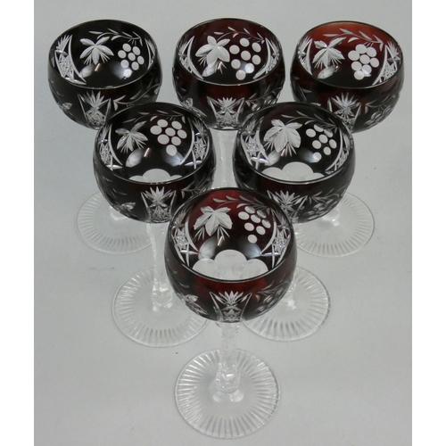 172 - A set of six Bohemian overlaid red cut glass wine glasses, height 19 cm (6).