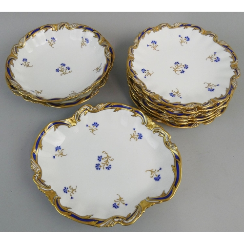 182 - A French porcelain set of set dessert plates and three bowls, by G. Demartine & Cie, Limoges, with b... 