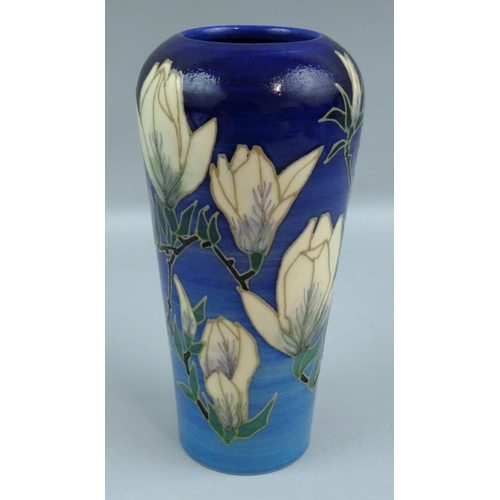 190 - A Dennis China Works vase of baluster form, the blue ground decorated with tulips, dated 2004, No. 2... 