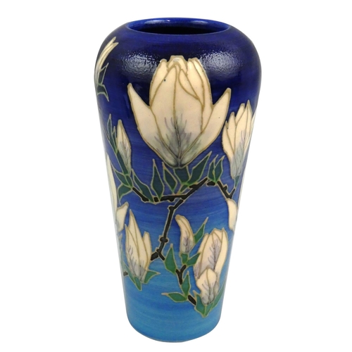 190 - A Dennis China Works vase of baluster form, the blue ground decorated with tulips, dated 2004, No. 2... 