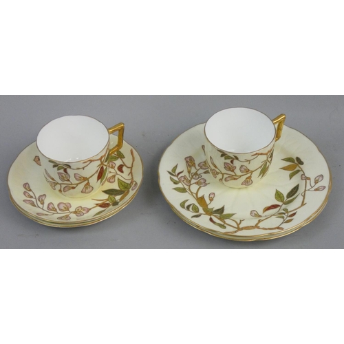 191 - A Moore Bros part tea set decorated with flowers and butterflies, with gilt trim, comprising a pair ... 