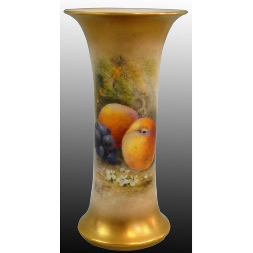 207 - A Royal Worcester blush ivory trumpet vase, with fruit decoration on apricot ground, signed Rickells... 