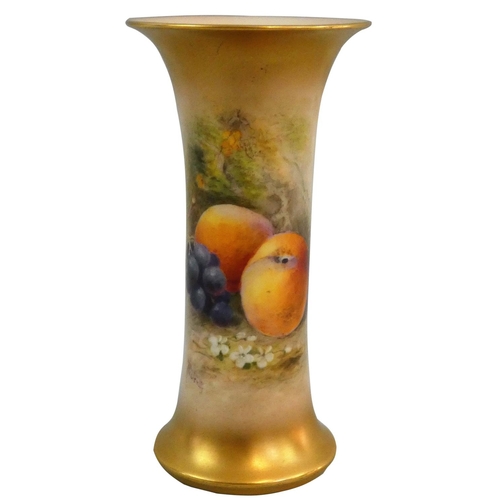 207 - A Royal Worcester blush ivory trumpet vase, with fruit decoration on apricot ground, signed Rickells... 