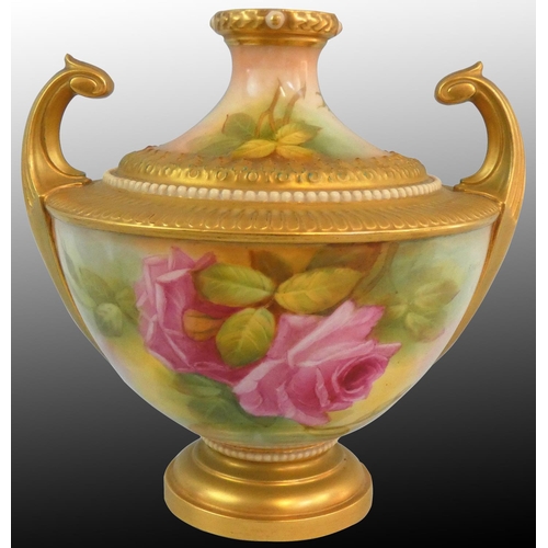 212 - A Royal Worcester blush ivory pattern vase of Grecian urn form, with a pair of upright gilt scroll h... 