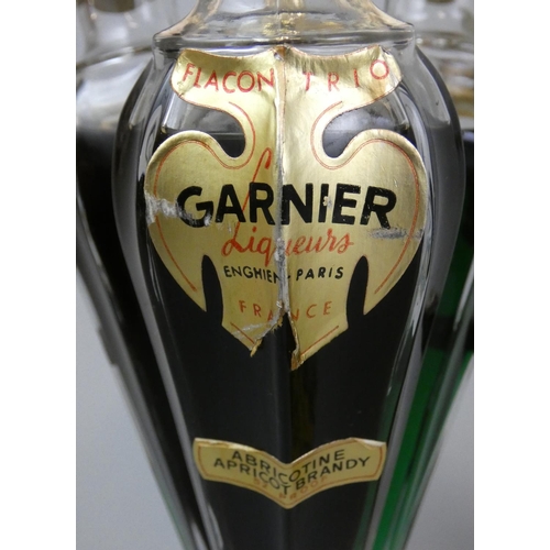 230 - Garnier triple decanter, Cherry brandy, Apricot brandy, Creme de Menthe, Garnier quadruple decanter,... 