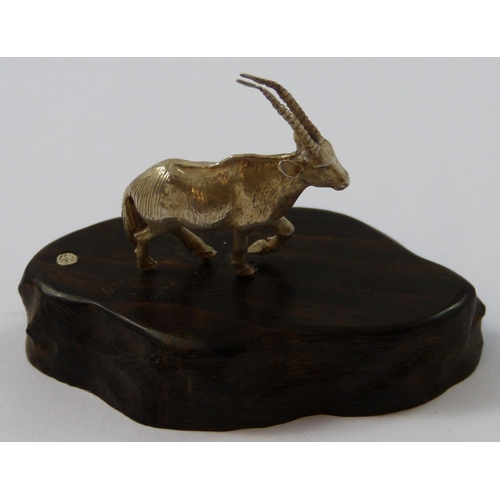 10 - Patrick Mavros, a Zimbabwean silver model of a long horned gazelle, c.1990, with his initials and Zi... 