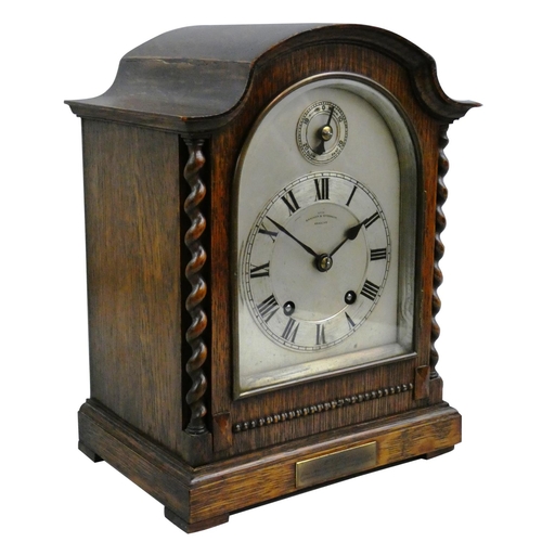 356 - An oak mantle clock, the silvered dial signed Bracher & Sydenham, Reading, with fast/slow dial, the ... 