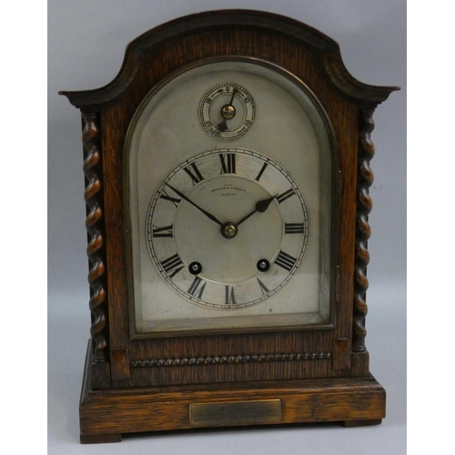 356 - An oak mantle clock, the silvered dial signed Bracher & Sydenham, Reading, with fast/slow dial, the ... 