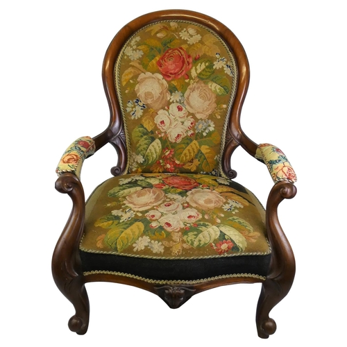 376 - A Victorian mahogany upholstered armchair, with scroll arms and cabriole front legs, tapestry uphols... 