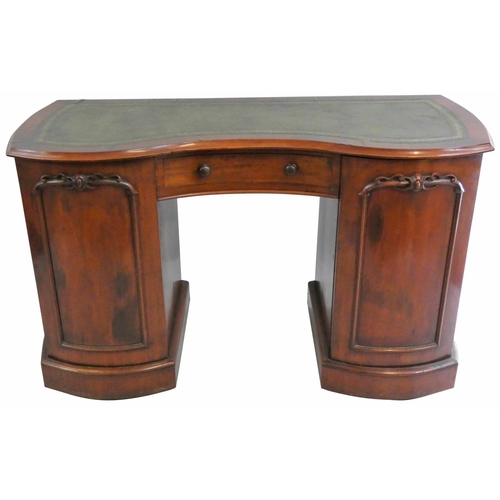 377 - Of Hull interest; A Victorian mahogany serpentine front pedestal desk, the central frieze drawer sta... 