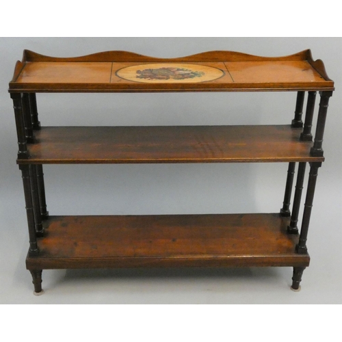 387 - An Edwardian mahogany and pine three tier open bookcase, the top section with painted shell motif, t... 