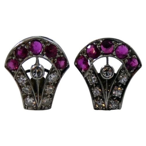 47 - A pair of Art Deco ruby and diamond earrings, converted from clips, the openwork stirrup design set ... 