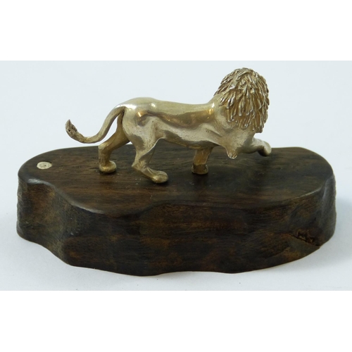 6 - Patrick Mavros, a Zimbabwean silver model of a lion, c.1990, with his initials and Zimbabwean hallma... 