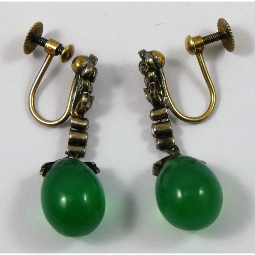 62 - An Edwardian pair of silver set stained green chalcedony and diamond ear pendants, set with a pear s... 