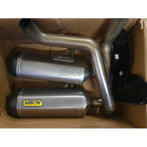 52 - A Triumph Speed Triple Arrow Low Boy exhaust system, part number A9600700, together with other simil... 