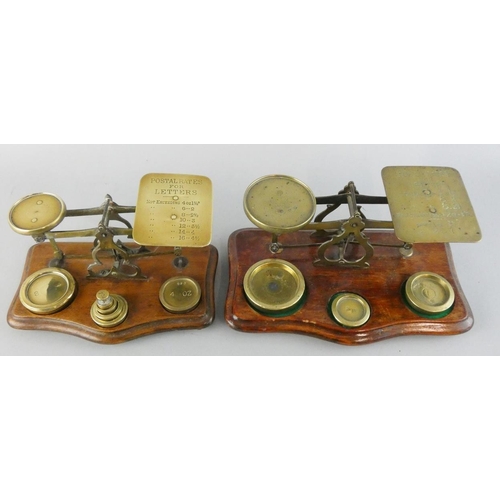 136 - A Victorian set of brass and mahogany postal scales, the plate inscribed with weights and prices, an... 