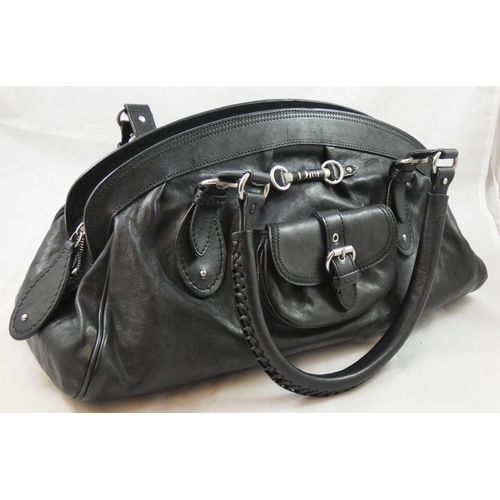 169 - Christian Dior, a black leather hand bag, serial number 01 - RU - 1006, dust bag.